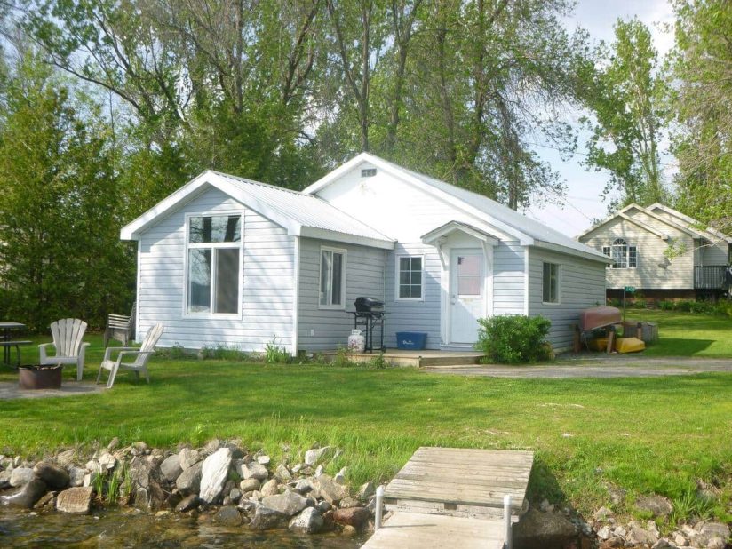 Lakefront cottage near Ottawa in White Lake, Ontario with private dock and waterfront yard